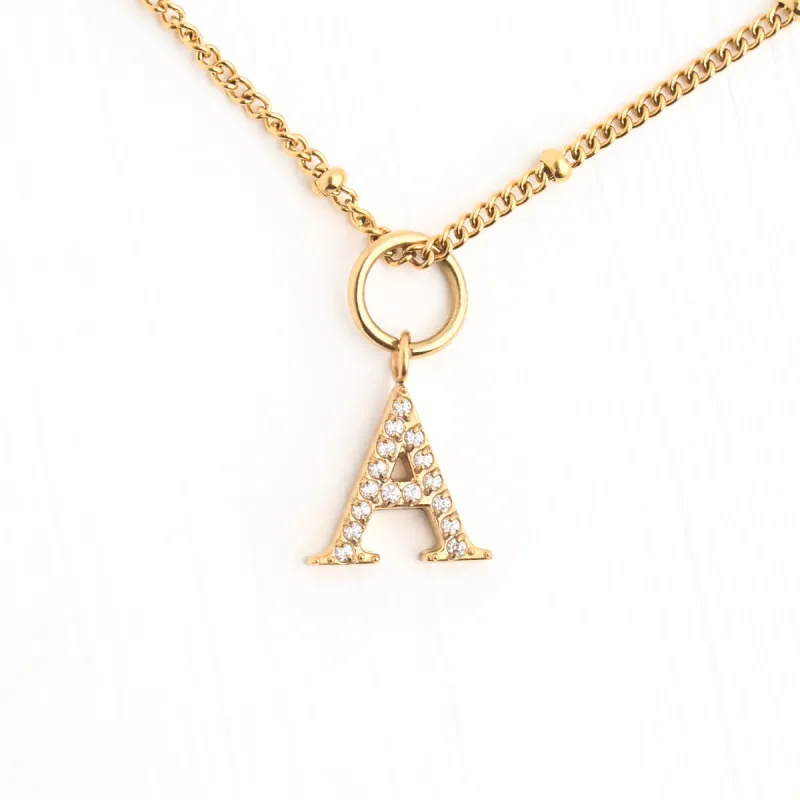 A Initial Long Necklace sold by Starfish Project