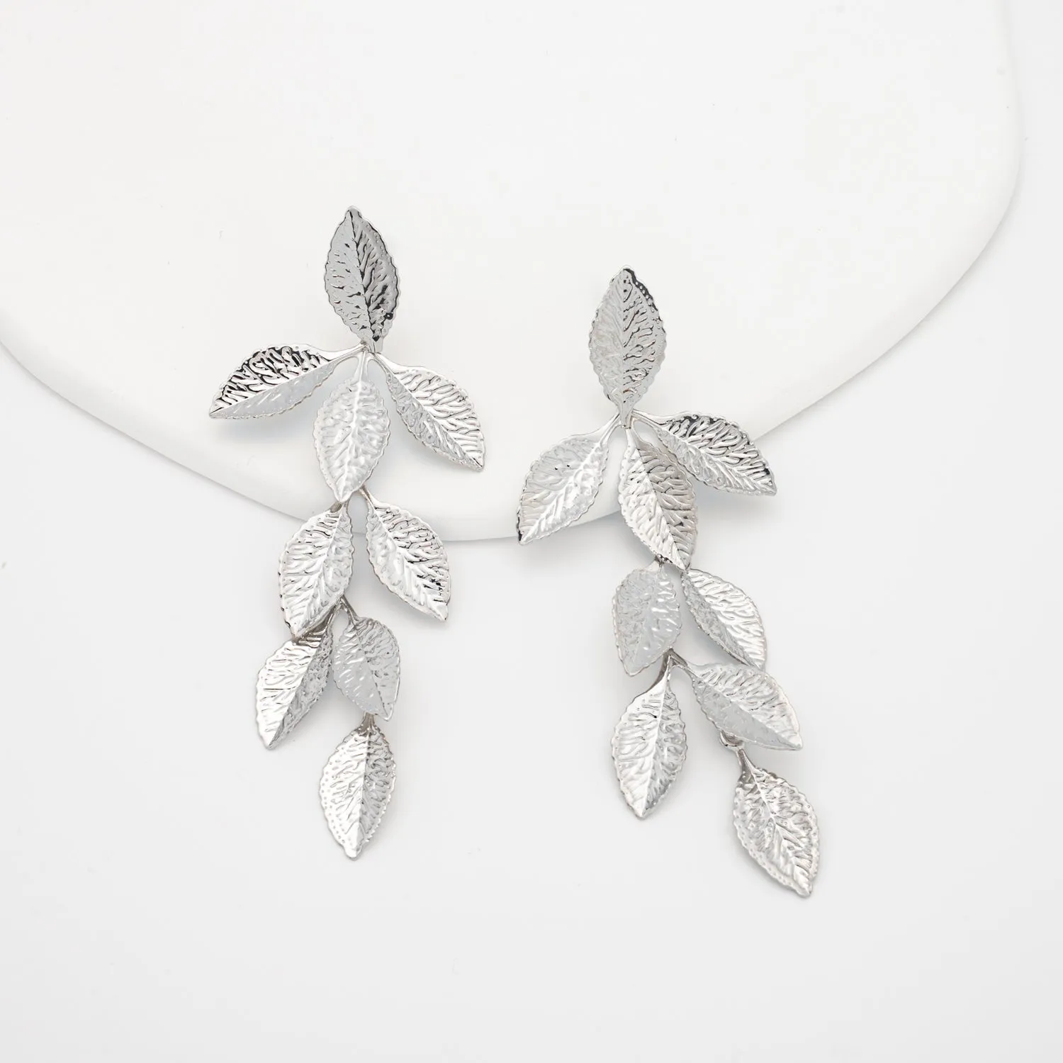 Cascade Leaf Earrings in Platinum sold by Starfish Project