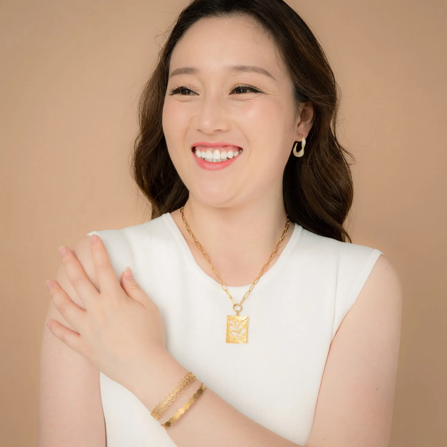 With a Twist Hoops in Soft Coral sold by Starfish Project product image thumbnail 2