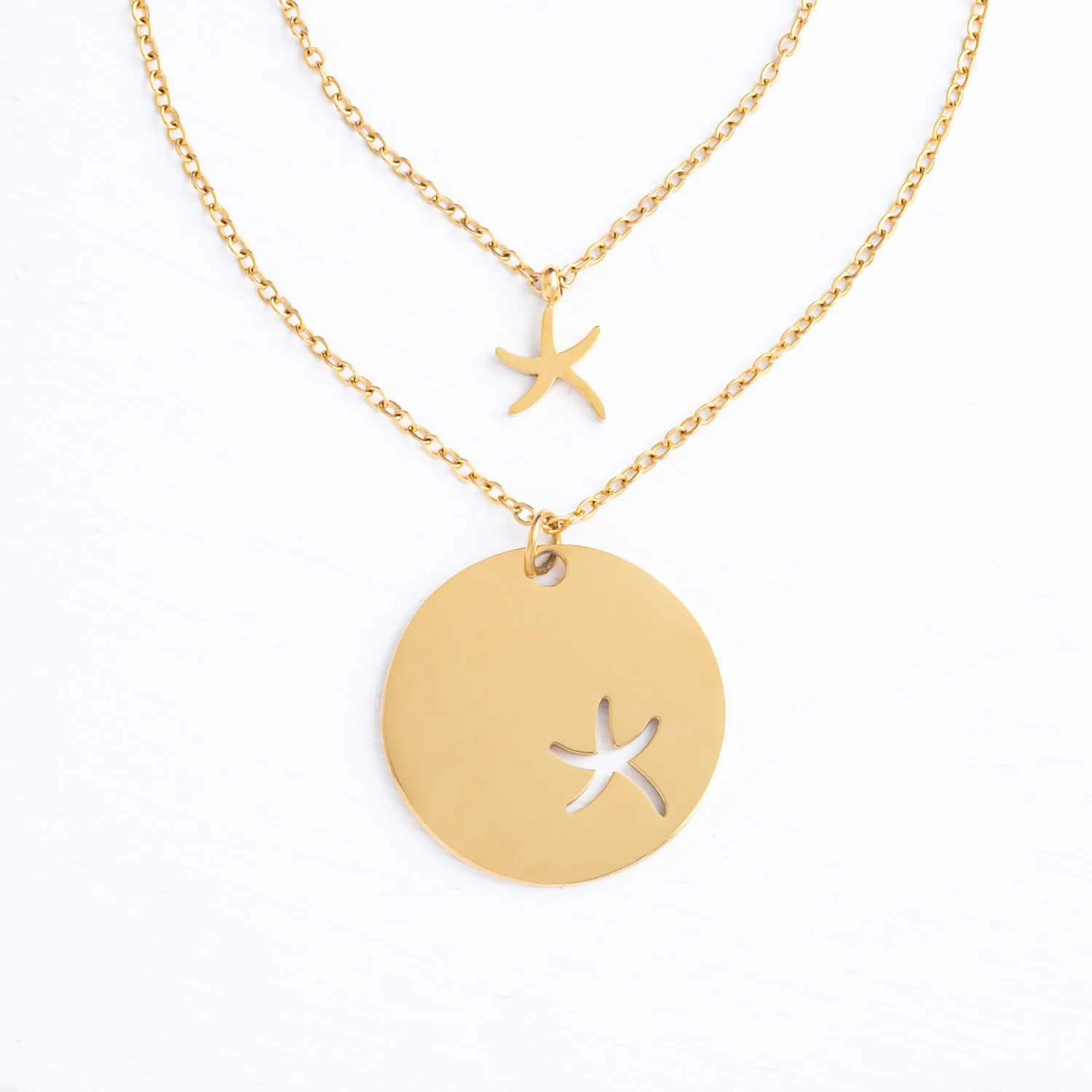 Community Gold Starfish Necklace Set sold by Starfish Project