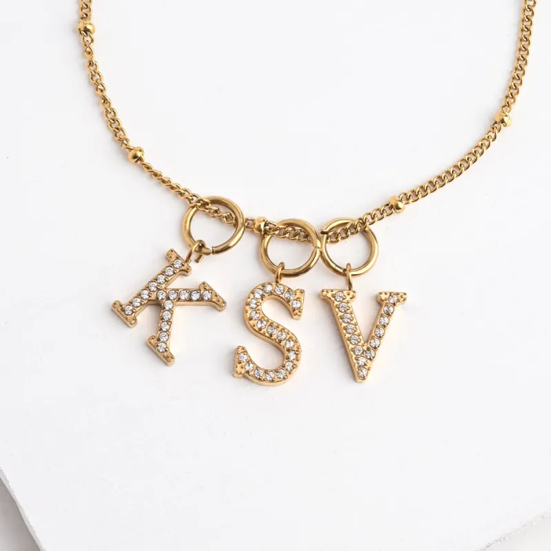 Initial Gold Necklace- Three Charms sold by Starfish Project