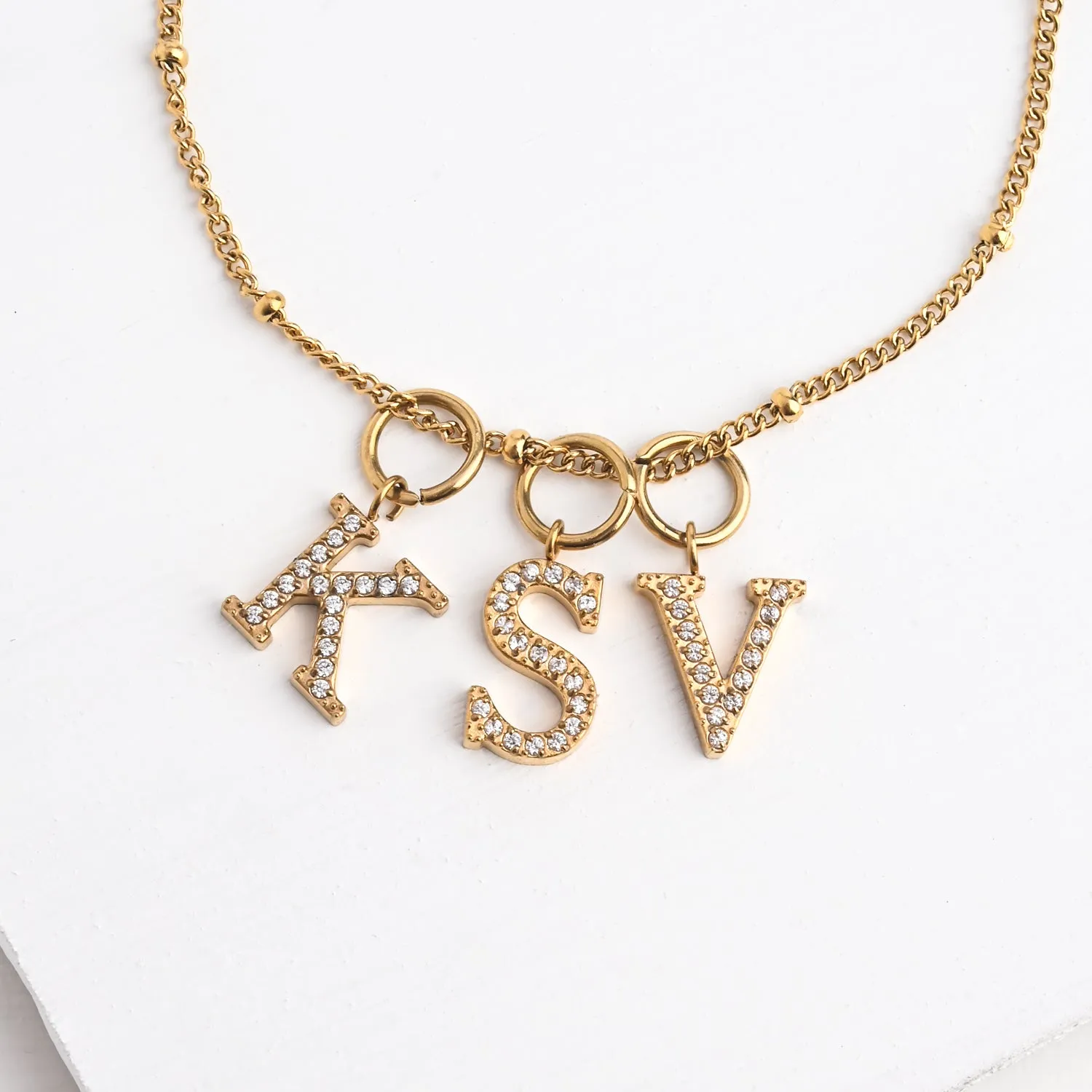 Initial Gold Necklace- Three Charms sold by Starfish Project