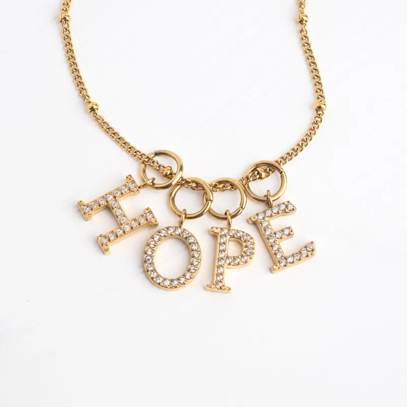 Initial Gold Necklace- Four Charms sold by Starfish Project