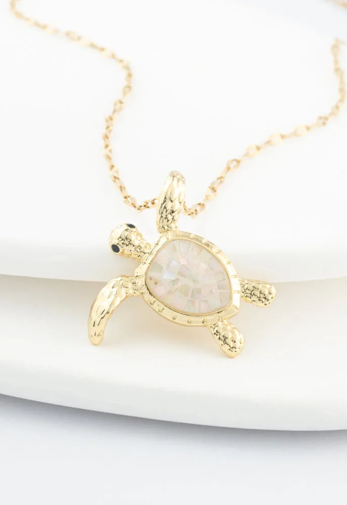 Turtle Necklace in Mother of Pearl sold by Starfish Project
