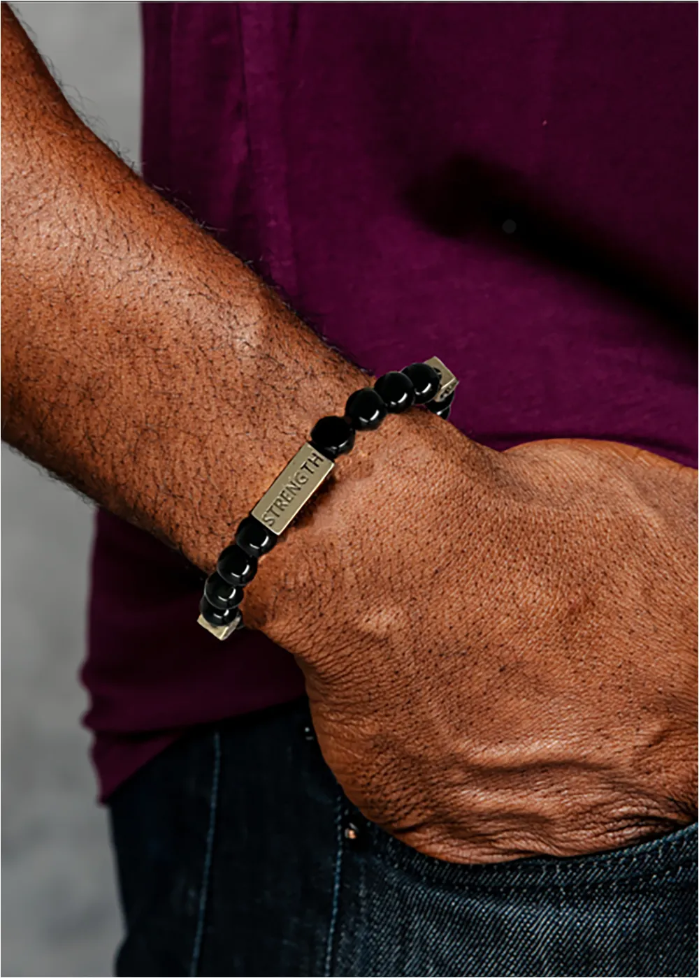 Agbara Unisex Adinkra Symbol Beaded Bracelet (Black Obsidian with Gold) sold by D'iyanu