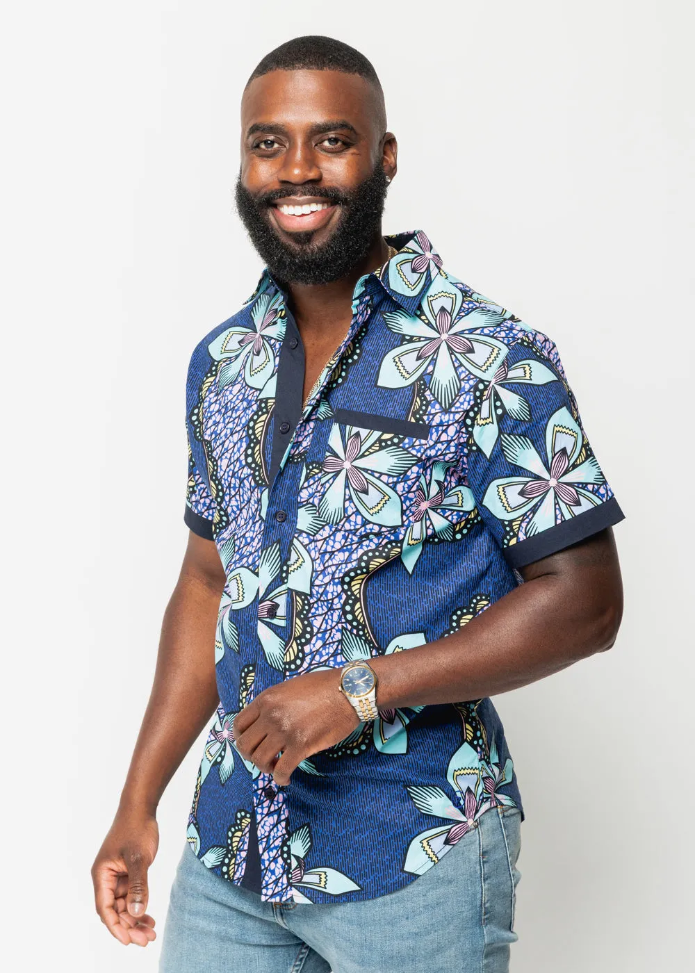 Deion Men's African Print Short Sleeve Button-Up Shirt (Light Blue Pink Iris) sold by D'iyanu
