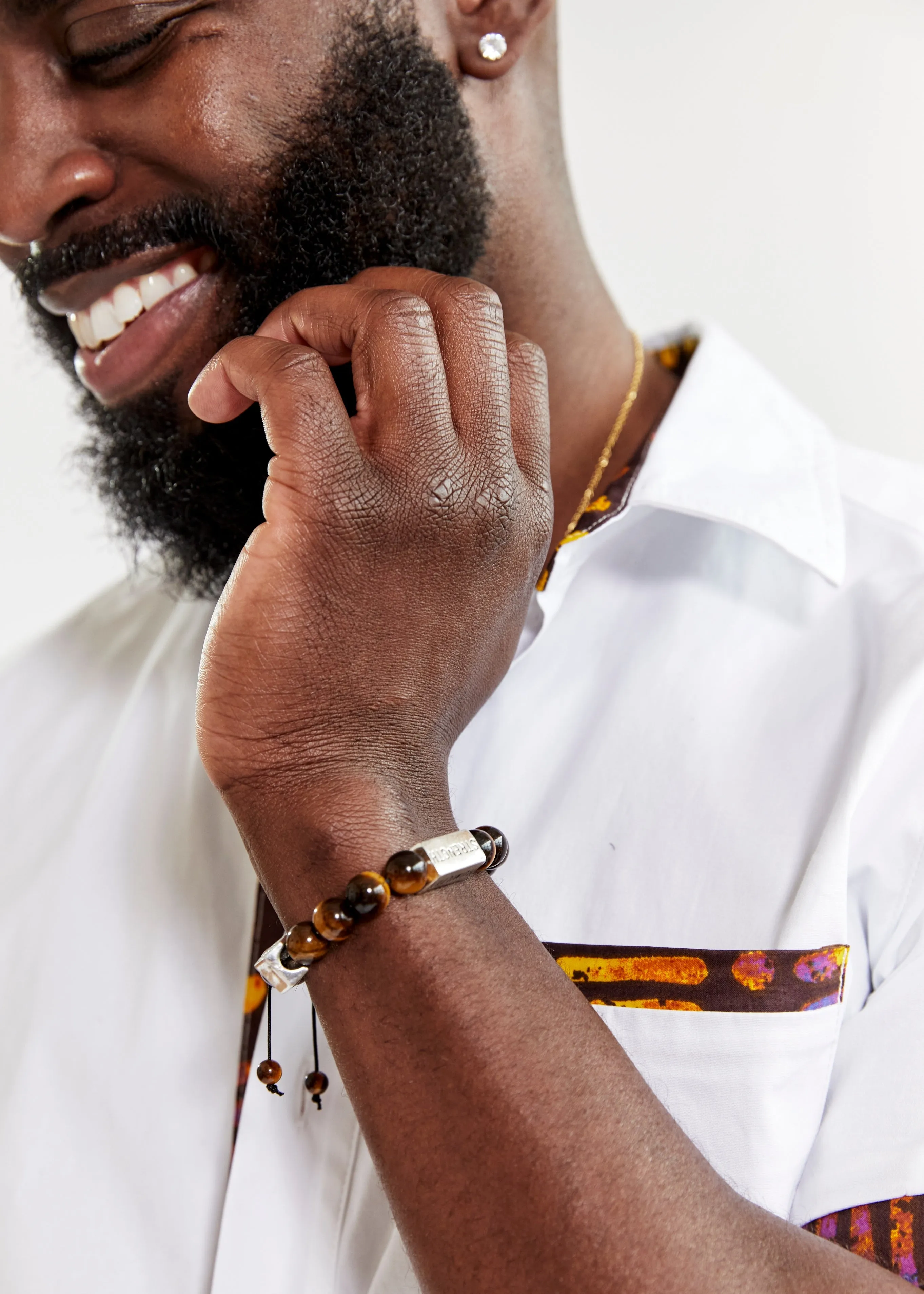 Irele Beaded Humility and Strength Adinkra Symbol Bracelet (Brown) sold by D'iyanu product image thumbnail 3