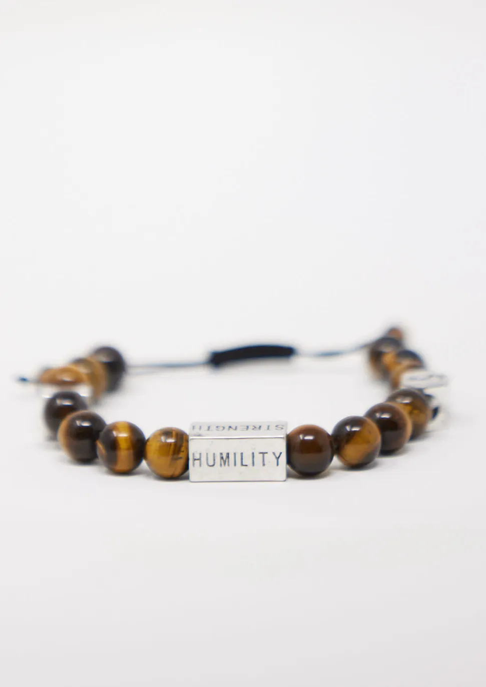 Irele Beaded Humility and Strength Adinkra Symbol Bracelet (Brown) sold by D'iyanu product image thumbnail 4