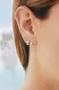 Emerald Cut Diamond Bezel Mini Huggie Earrings sold by EF Collection