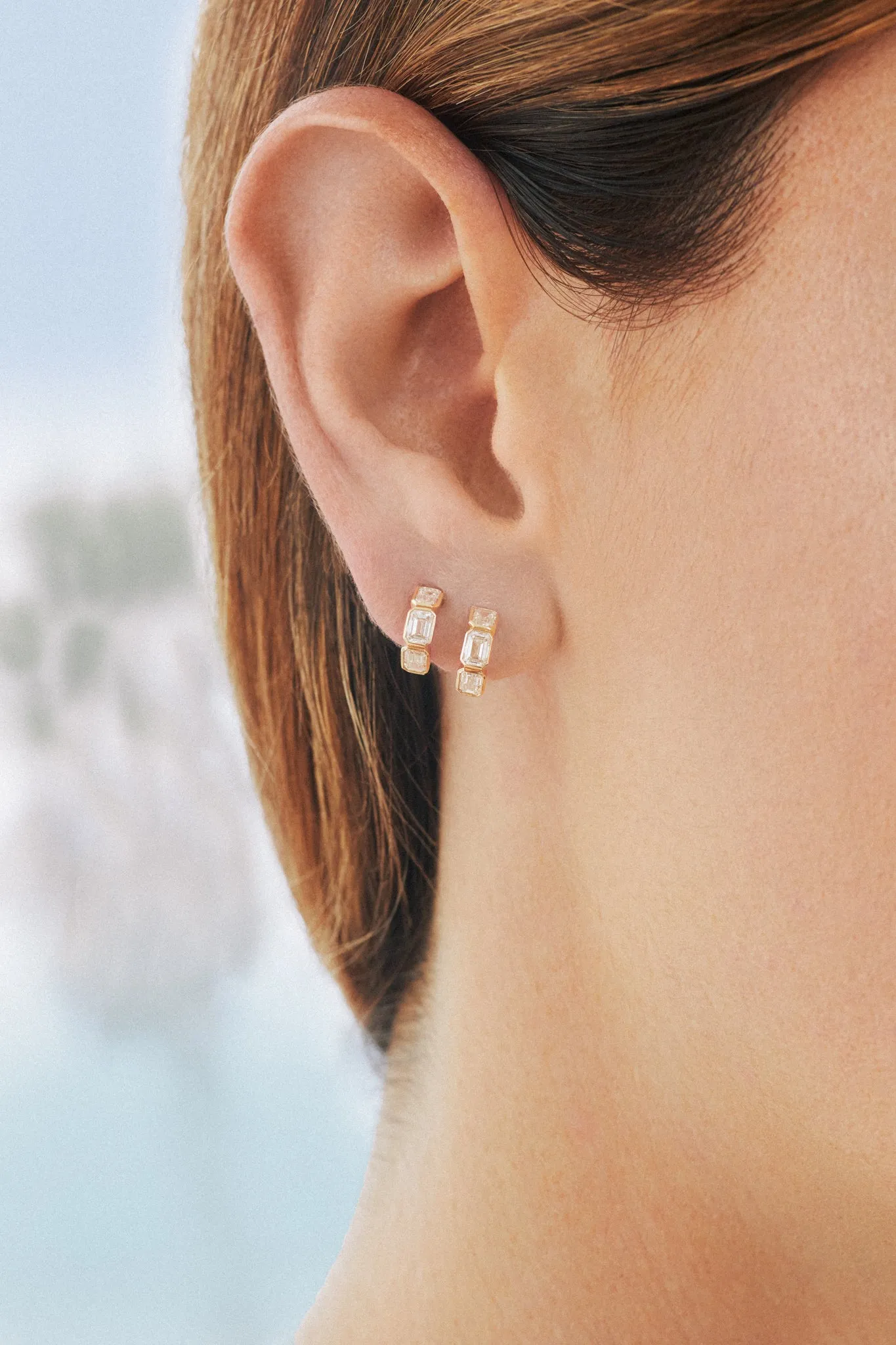 Emerald Cut Diamond Bezel Mini Huggie Earrings sold by EF Collection product image thumbnail 2