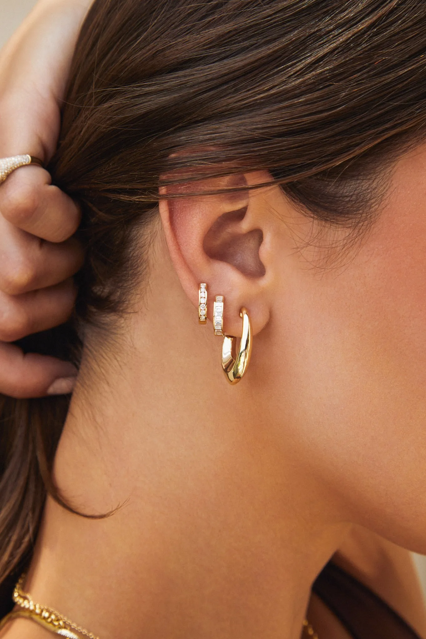 Channel Set Diamond Huggie Earrings sold by EF Collection product image thumbnail 2