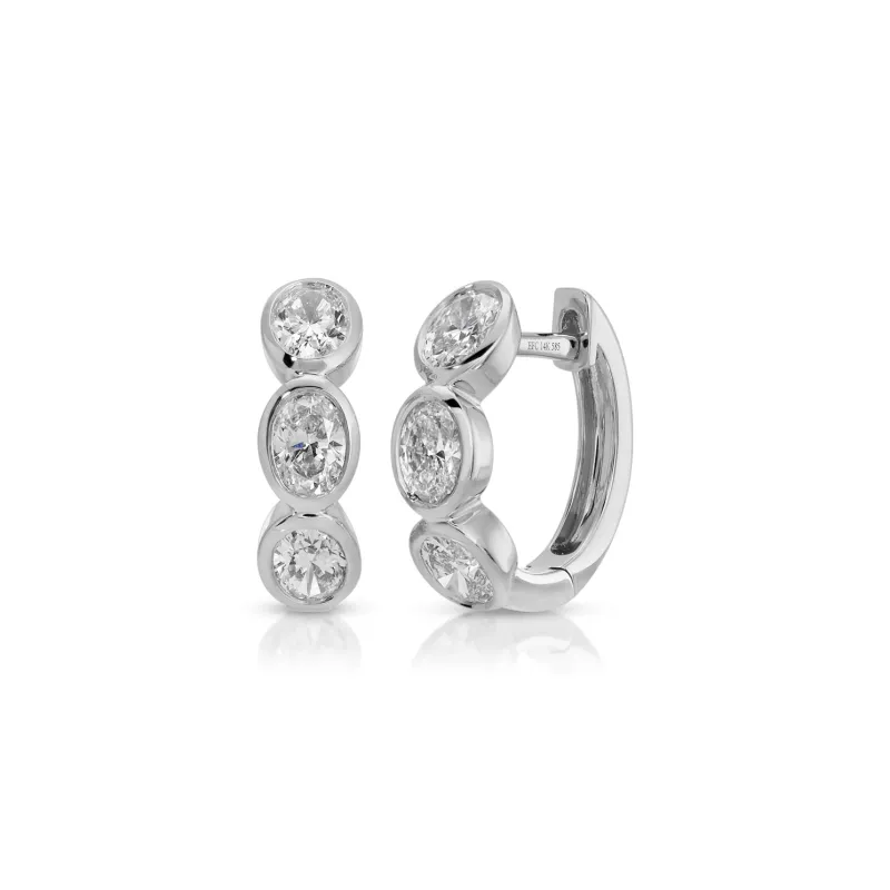 Bezel Set Oval Diamond Huggie Earrings sold by EF Collection