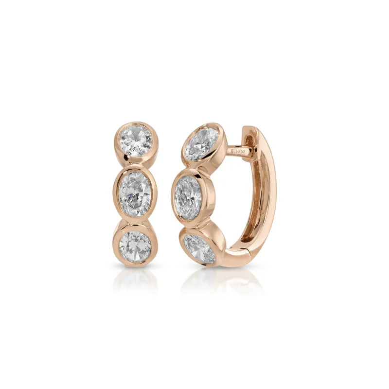 Bezel Set Oval Diamond Huggie Earrings sold by EF Collection