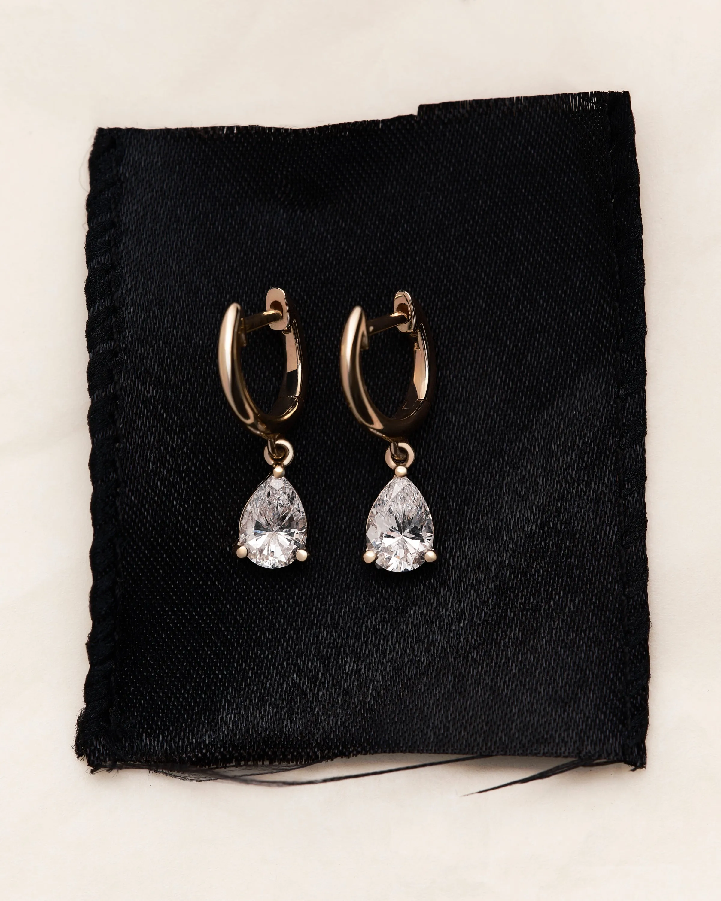 Diamond Pear Drop Huggie Earrings sold by EF Collection product image thumbnail 3