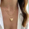 Gold and Diamond Heart Locket Necklace sold by EF Collection