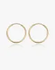 Large Thin Infinity Hoops sold by Midori Jewelry Co.