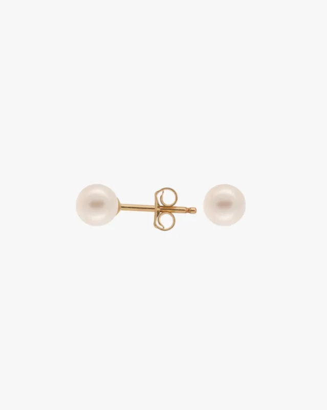 Petit Pearl Studs sold by Midori Jewelry Co.