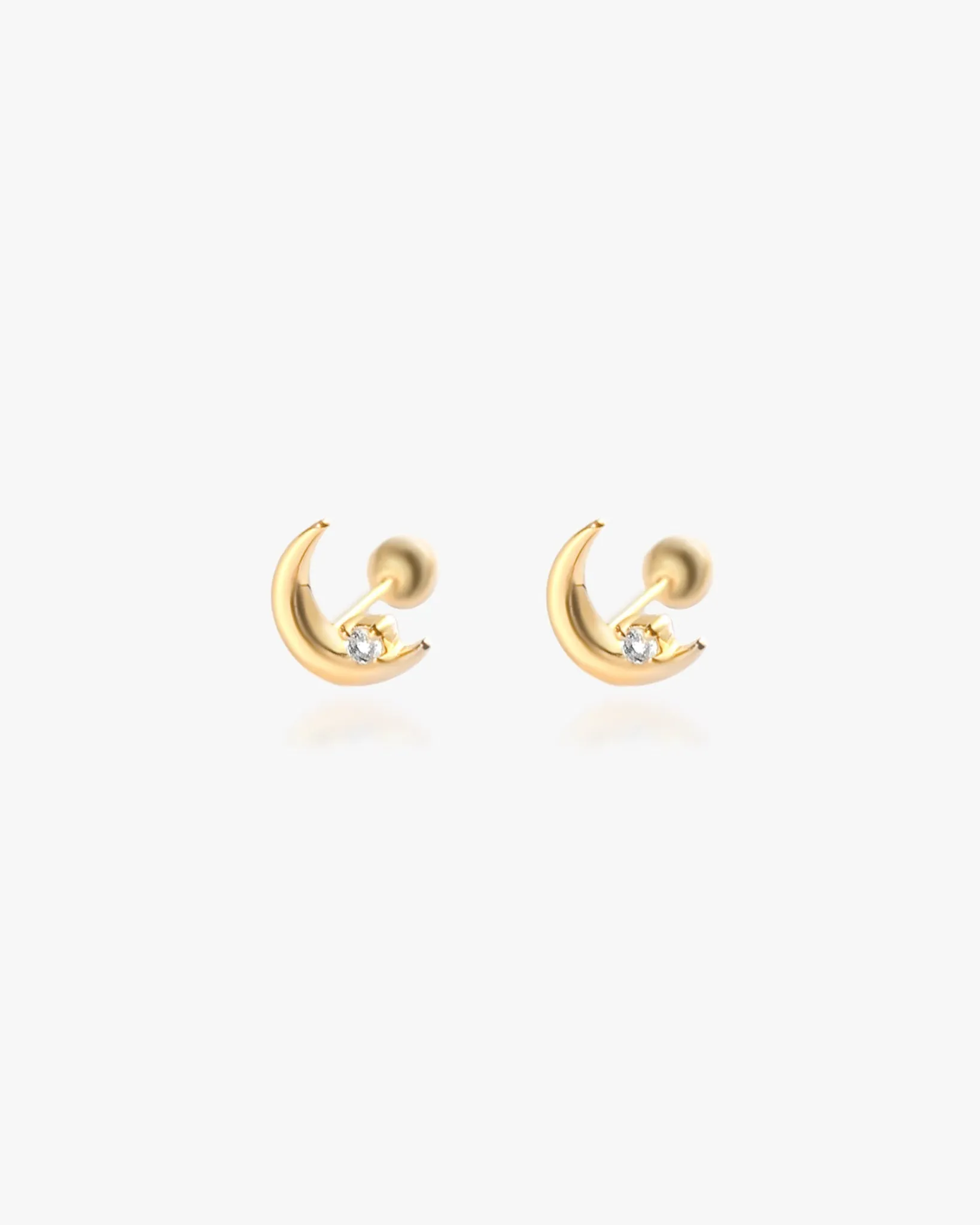 Crescent Moon Studs in Vermeil sold by Midori Jewelry Co.