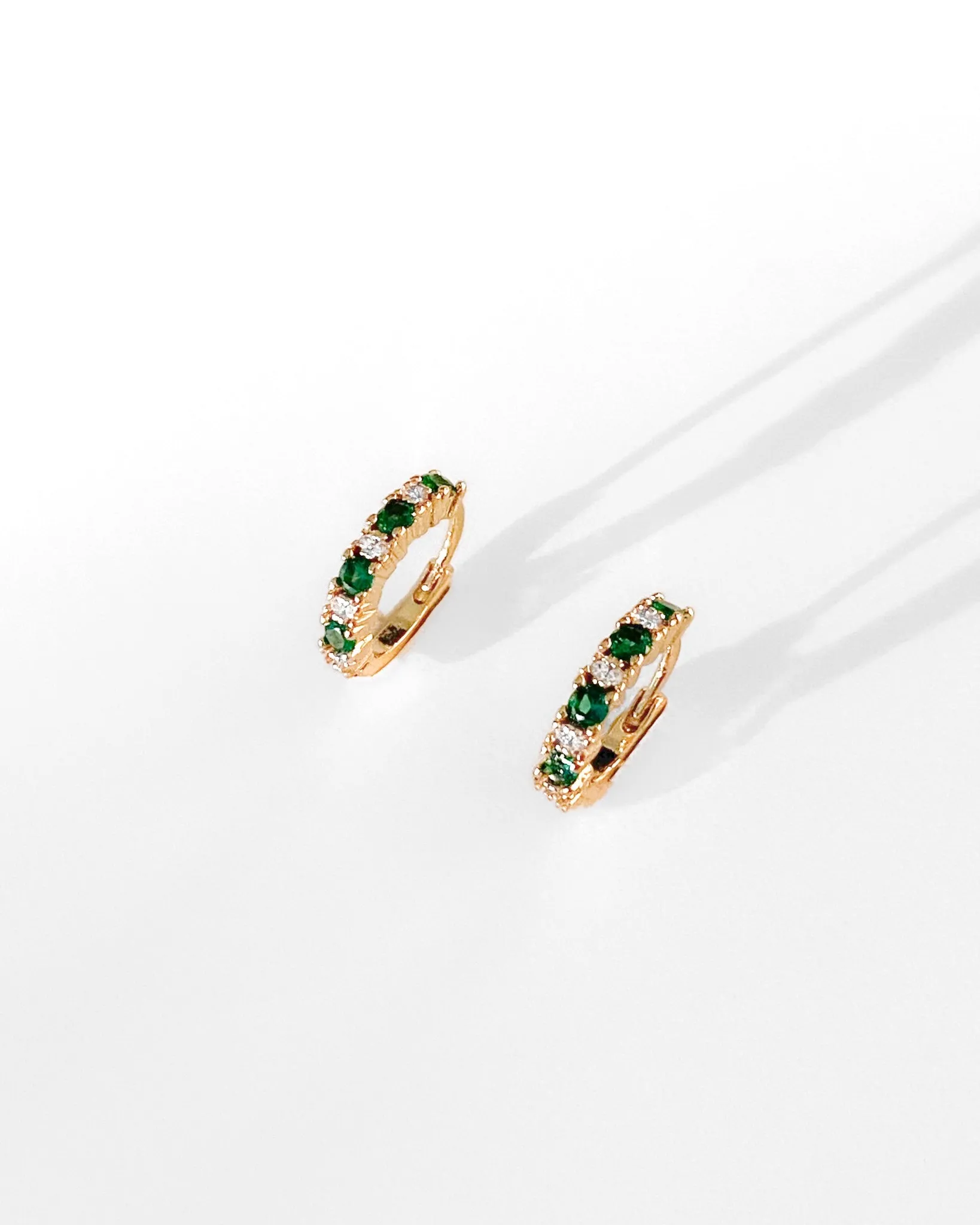 Emerald Hoops sold by Midori Jewelry Co.