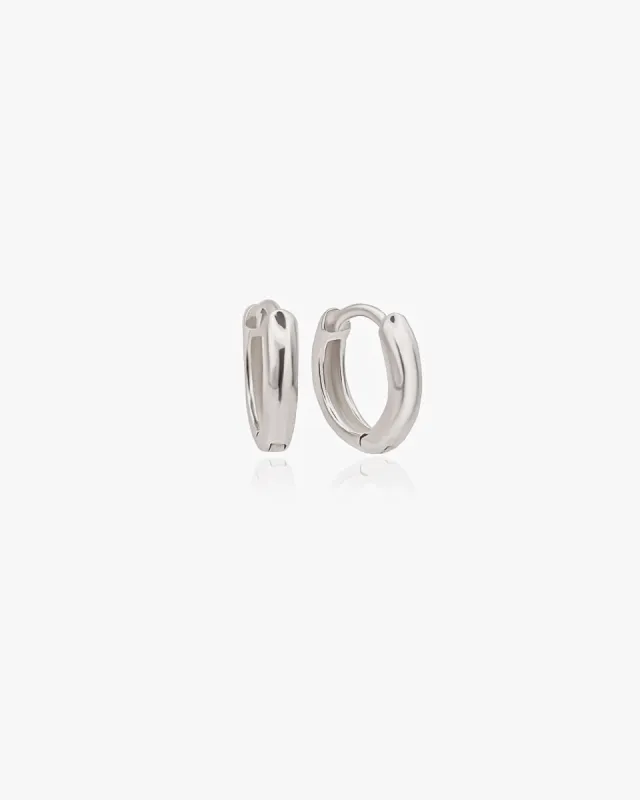 Mini Huggie Hoops sold by Midori Jewelry Co.