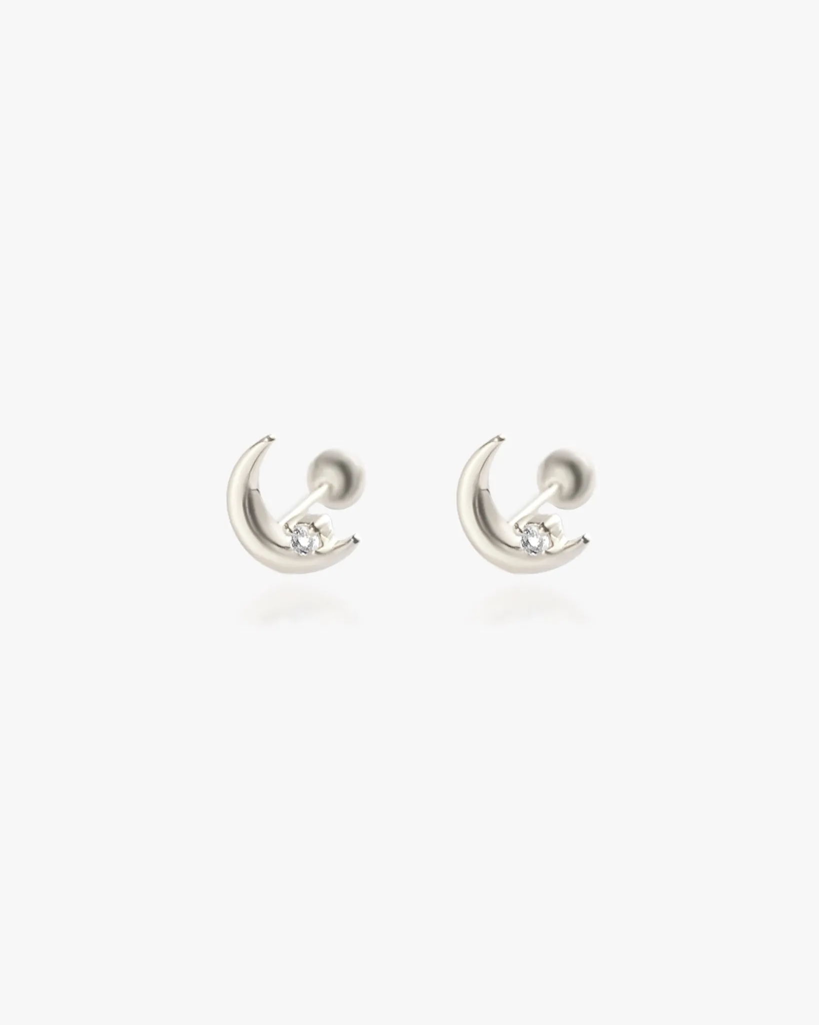 Crescent Moon Stud sold by Midori Jewelry Co.