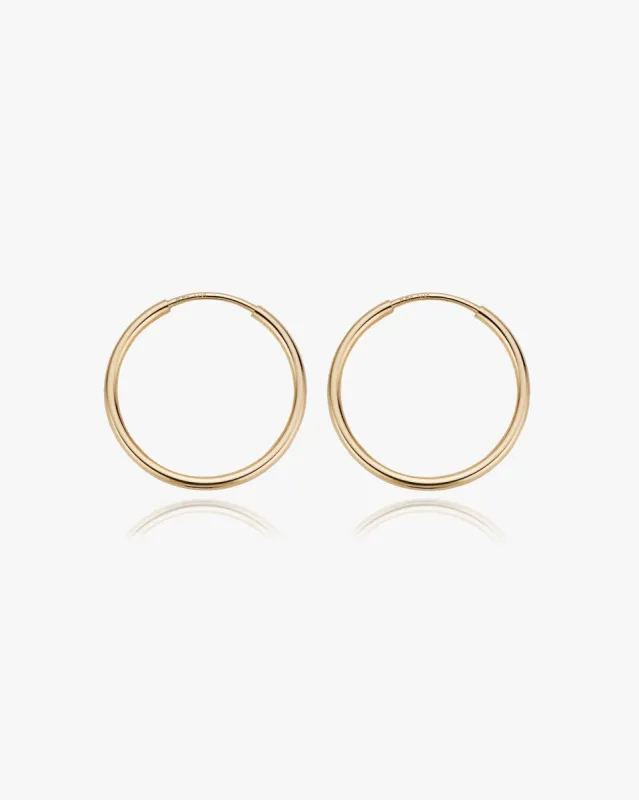 Medium Thin Infinity Hoops sold by Midori Jewelry Co.