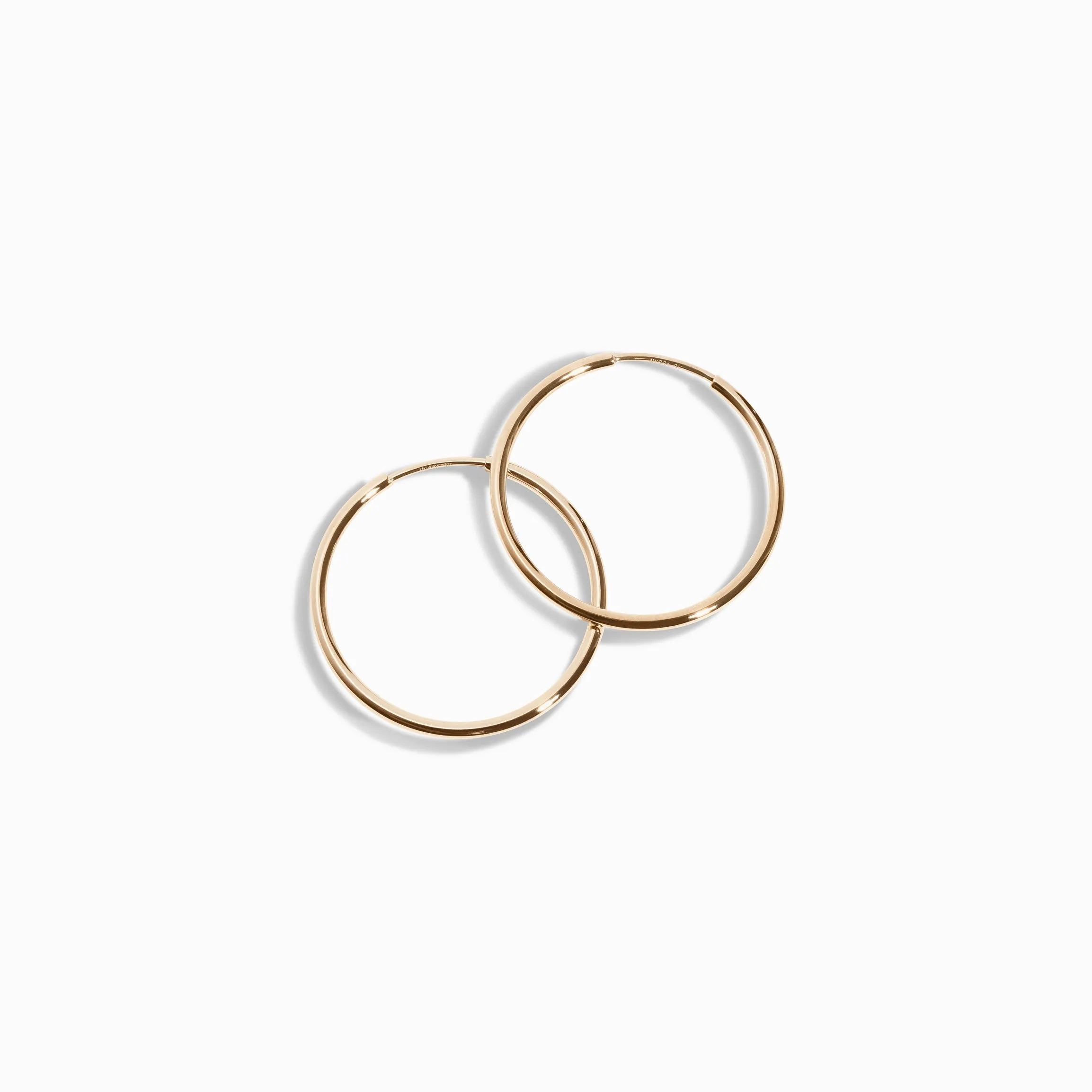 Thin Midi Hoop Earrings / 9K and 18K Solid Gold sold by Nyrelle Jewelry