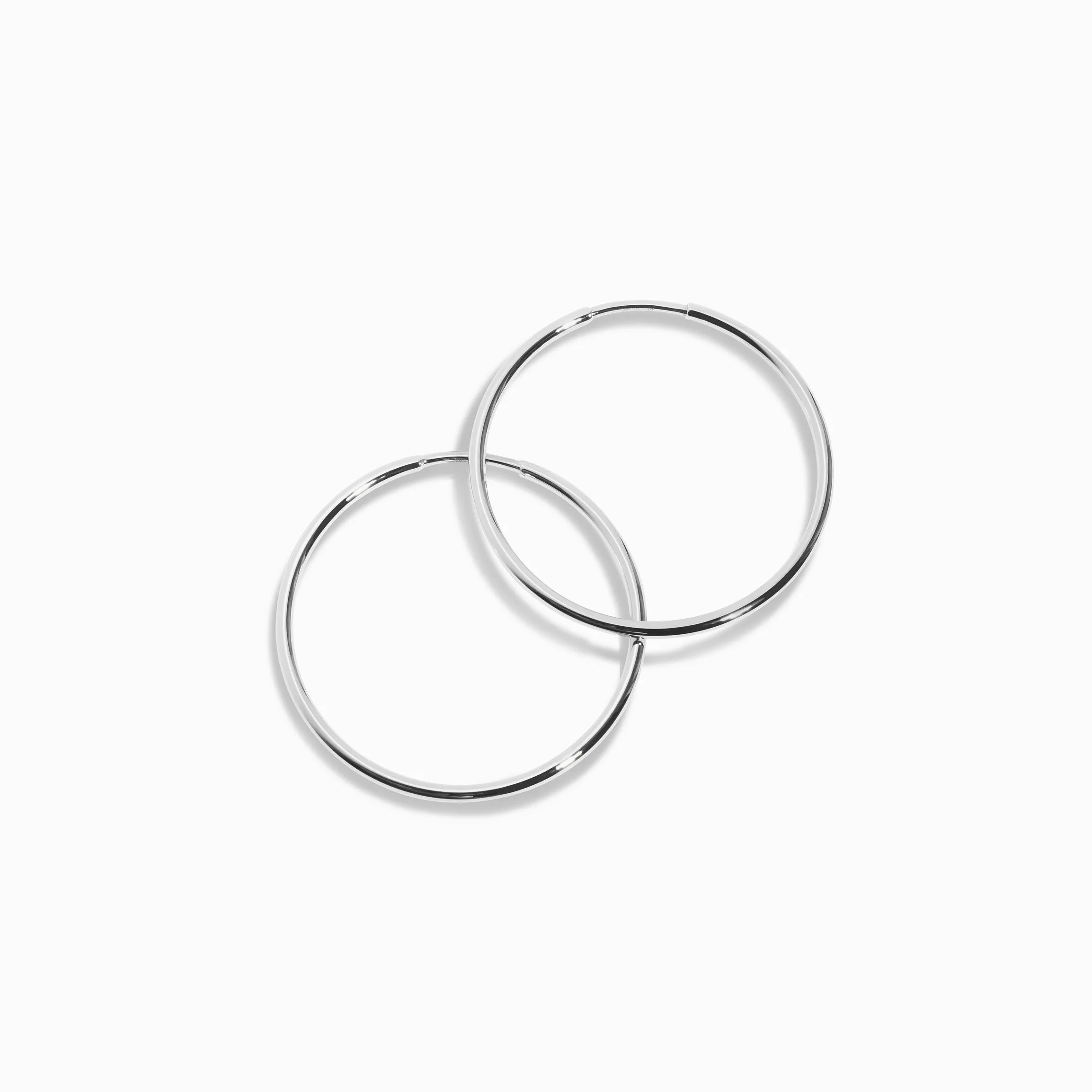 Thin Inbetween Hoop Earrings / 9K and 18K Solid Gold sold by Nyrelle Jewelry product image thumbnail 3