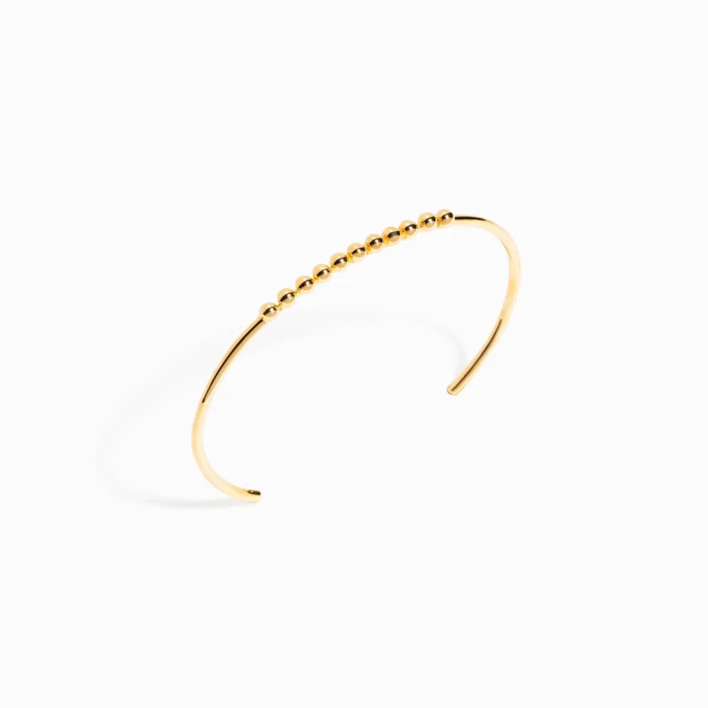 Spheres Bangle / Vermeil sold by Nyrelle Jewelry