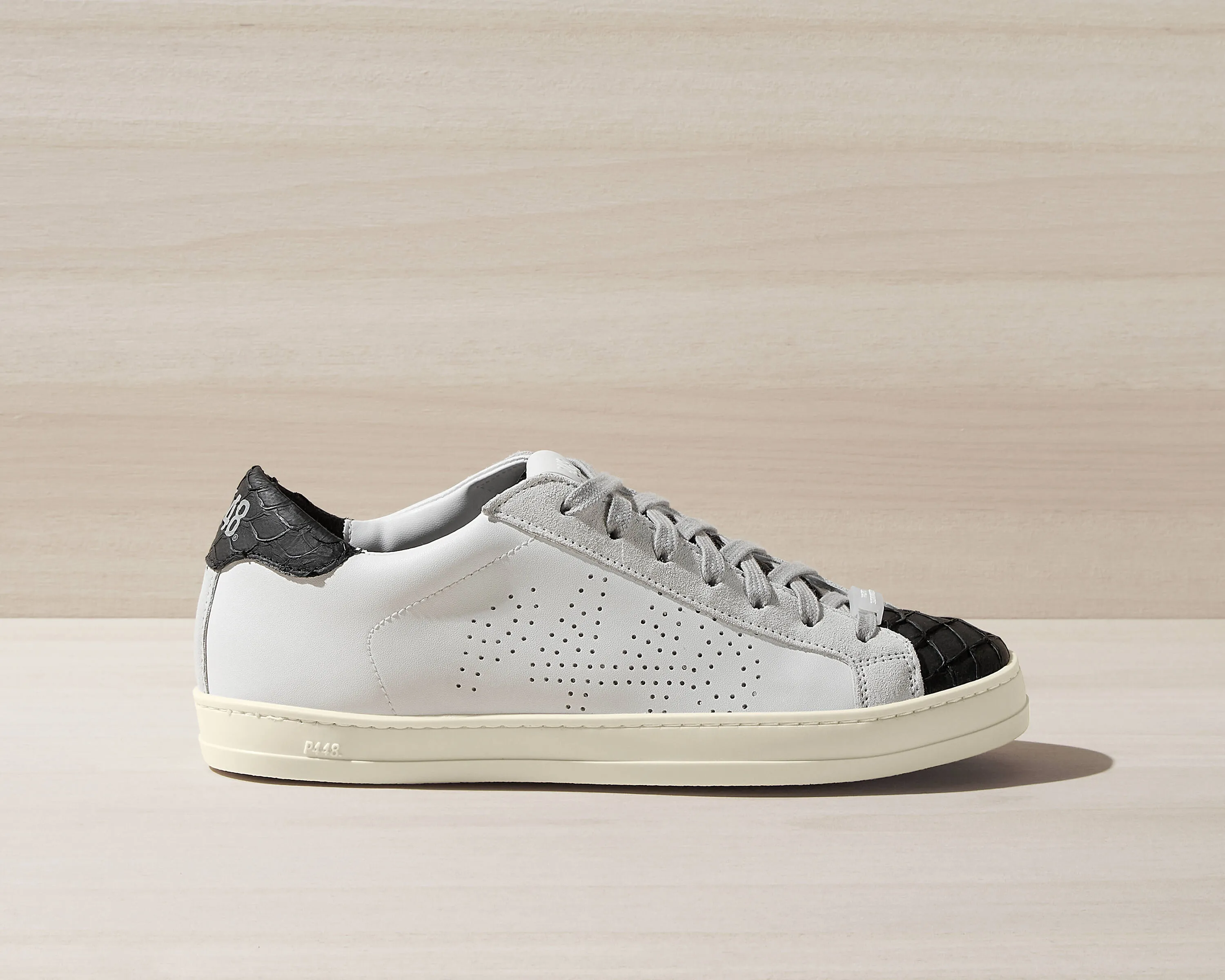 John Carp/Black sold by P448