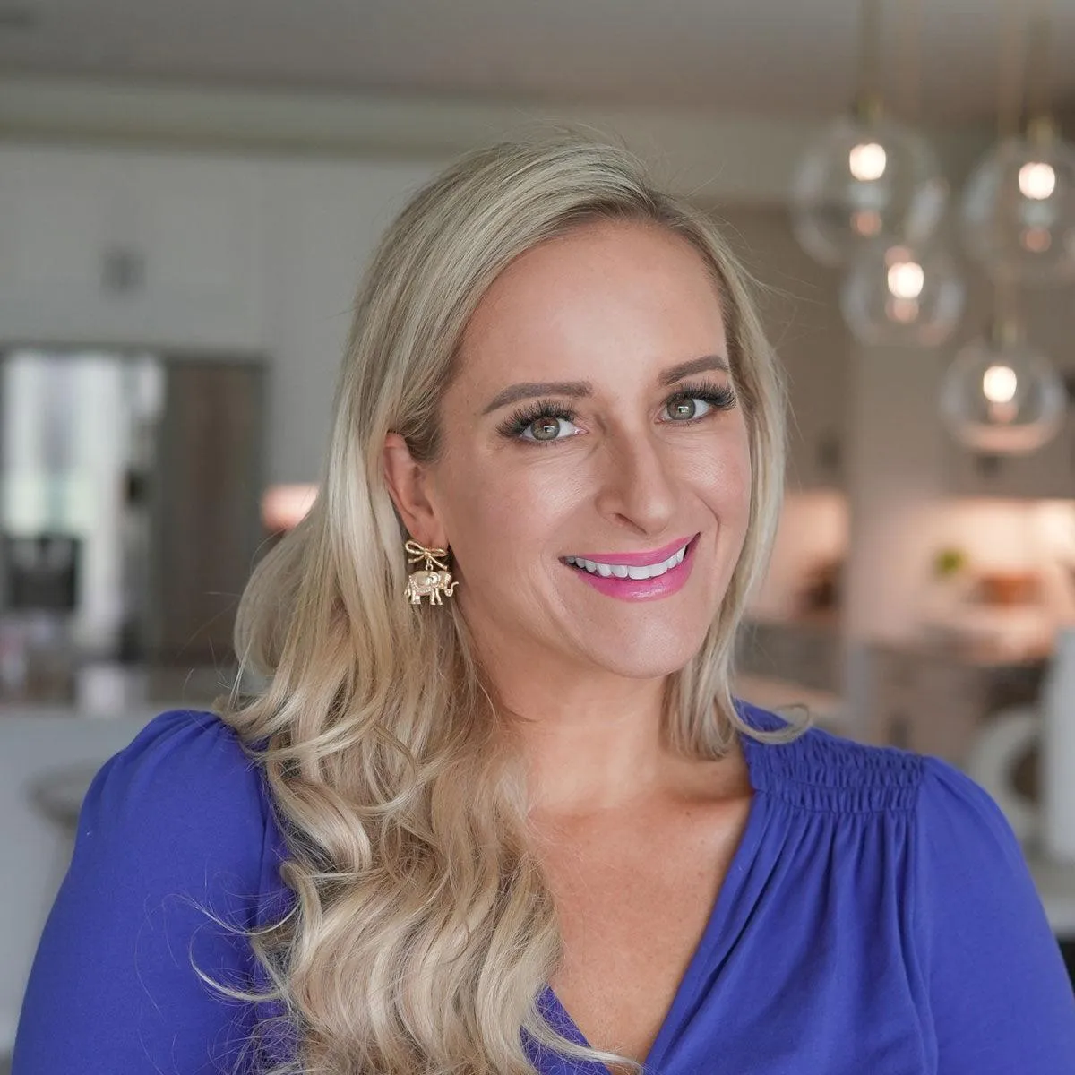 Vega Pearl-Studded Elephant & Bow Drop Earrings in Worn Gold sold by Canvas Style product image thumbnail 2