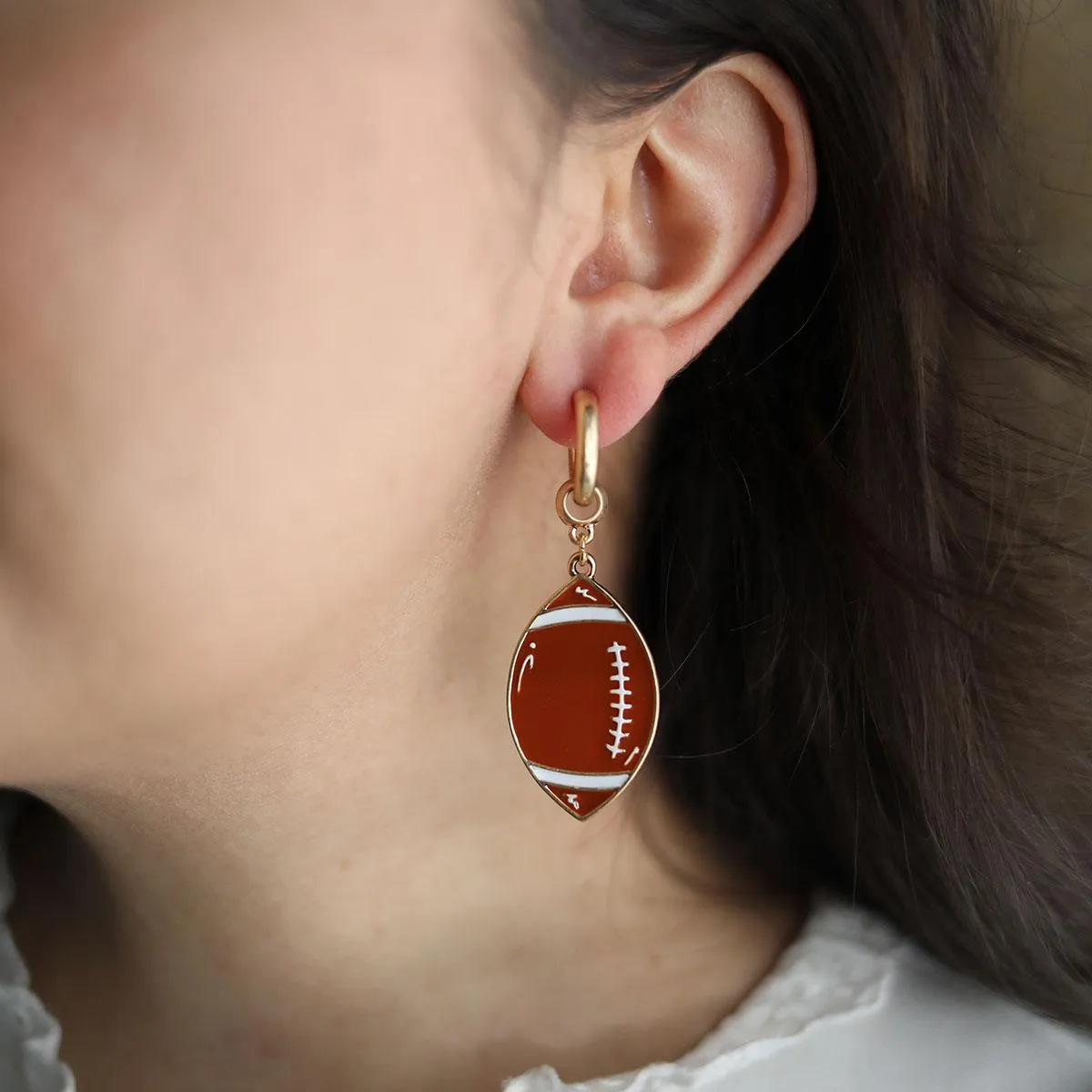 Game Day Enamel Football Drop Hoop Earrings in Worn Gold sold by Canvas Style product image thumbnail 2
