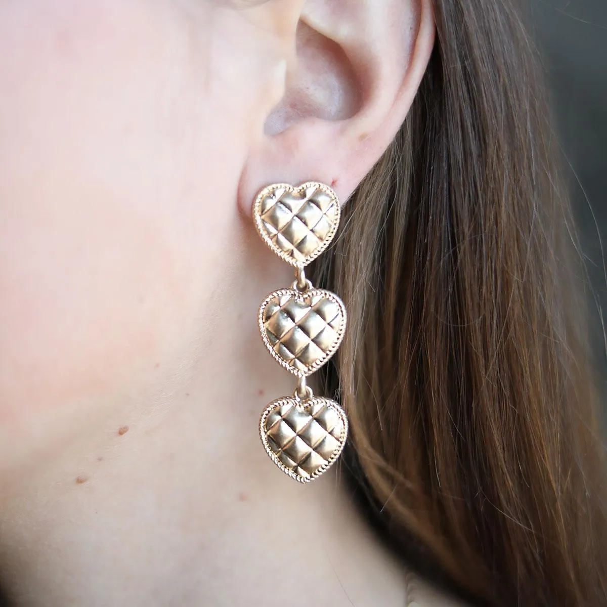 Beatrice Quilted Metal Triple Heart Drop Earrings in Worn Gold sold by Canvas Style product image thumbnail 2