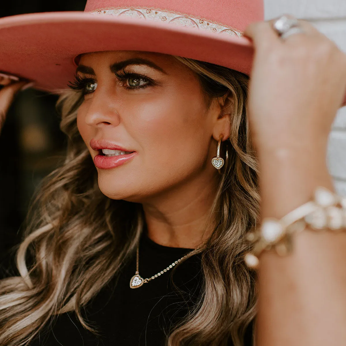 Corrine Pavé Heart Hoop Earrings in Worn Gold sold by Canvas Style product image thumbnail 2