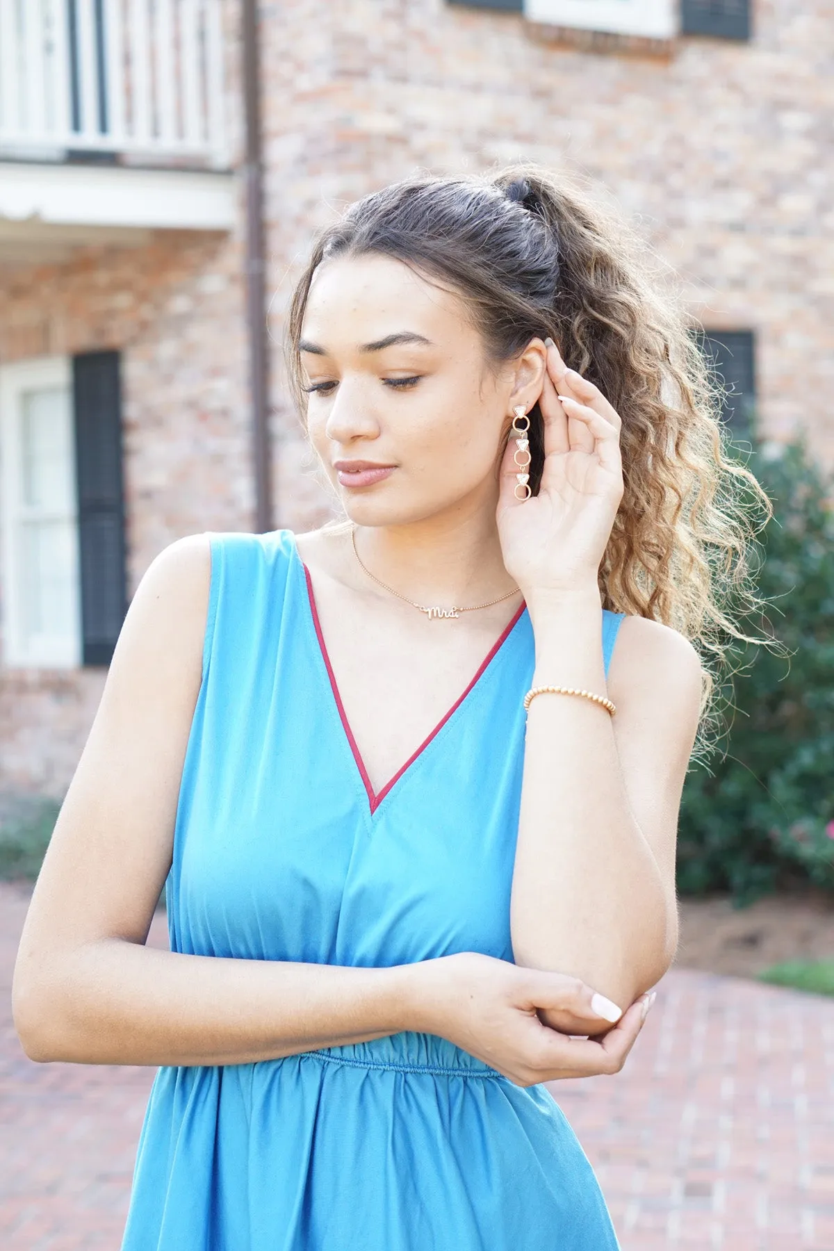 Put a Ring On It Linked Earrings in Shiny Gold sold by Canvas Style product image thumbnail 2