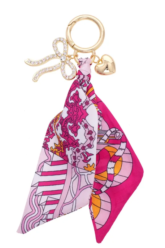 Carley Pave Bow Scarf Bag Charm in Light Pink/Fuchsia sold by Canvas Style