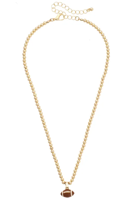Football Enamel Ball Bead Necklace in Shiny Gold sold by Canvas Style