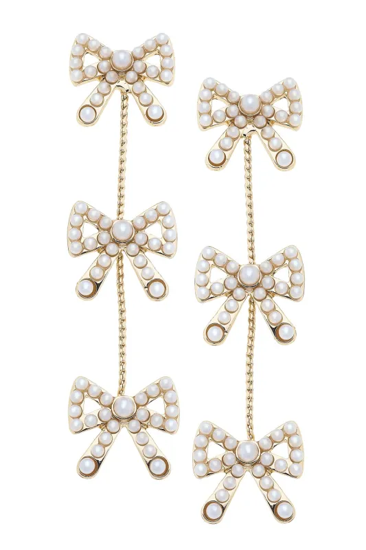 Dawn Pearl Studded Bow Linked Earrings in Ivory sold by Canvas Style