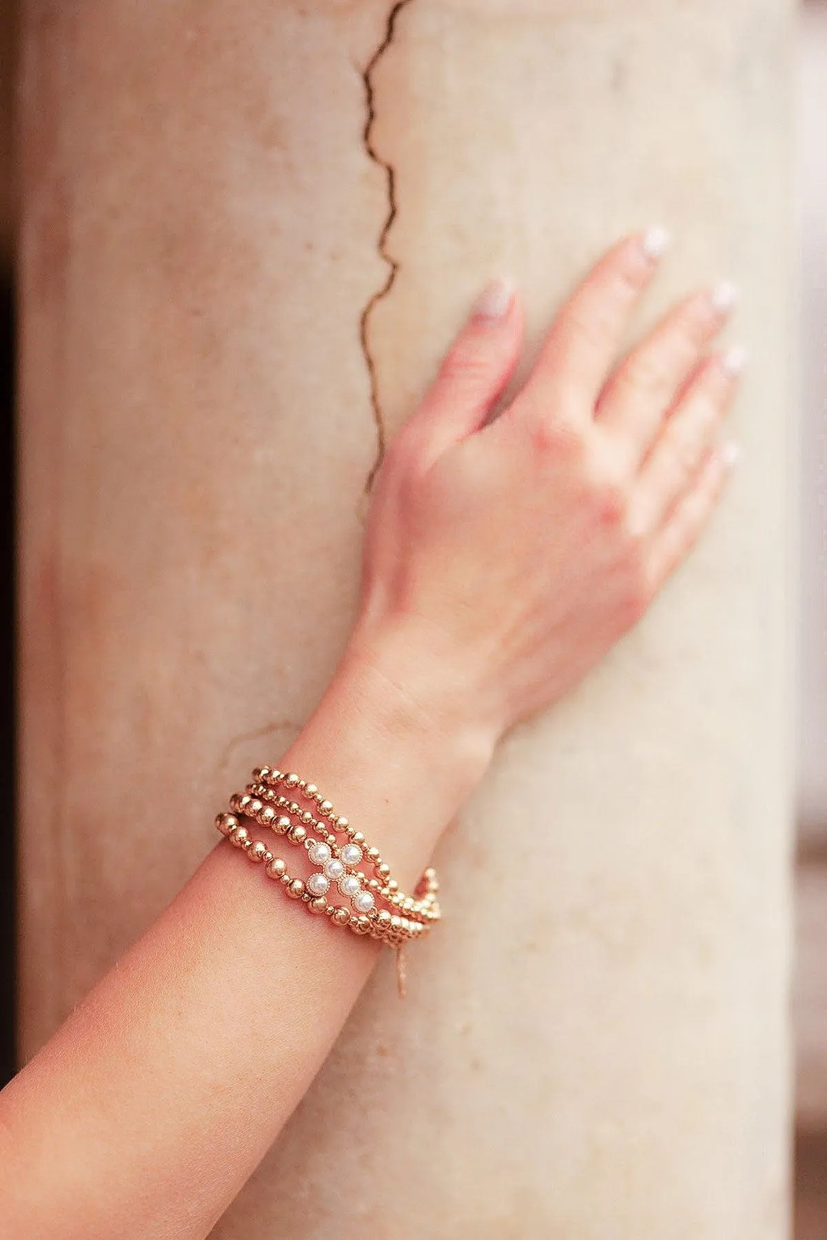 Elisha Pearl Cross Stretch Bracelet in Worn Gold sold by Canvas Style product image thumbnail 2