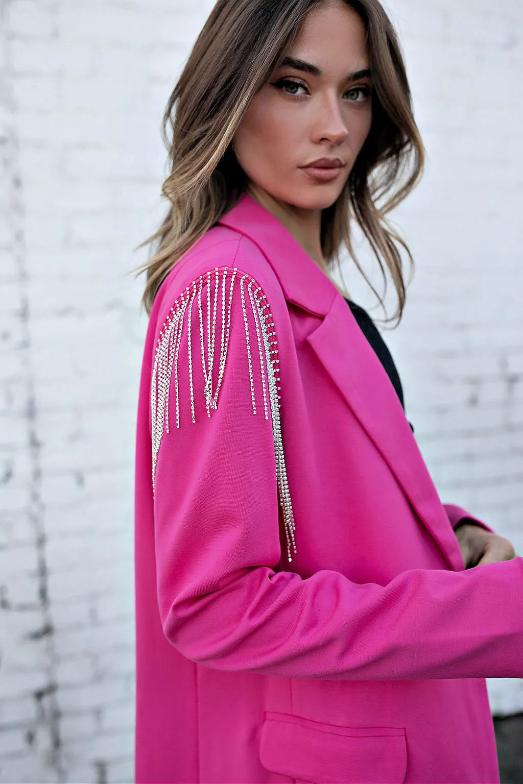The Rhinestone Fringe Shoulder Fuschia Blazer sold by Glitzy Bella