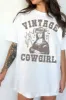 FINAL SALE!! Vintage Cowgirl Graphic Oversized Tee in White sold by Glitzy Bella