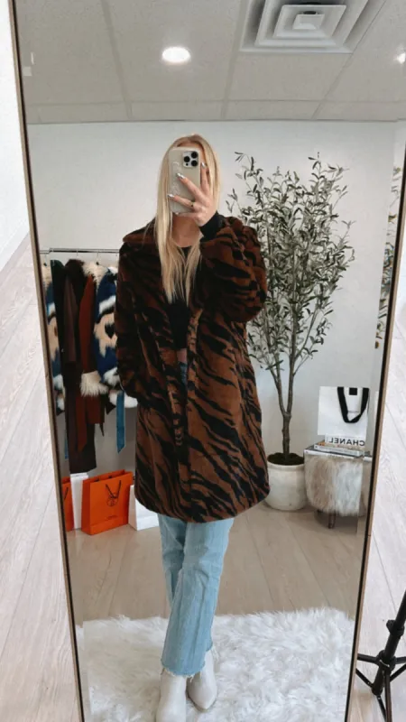FINAL SALE!! The "Destined for Fame" Faux Fur Jacket in Zebra sold by Glitzy Bella