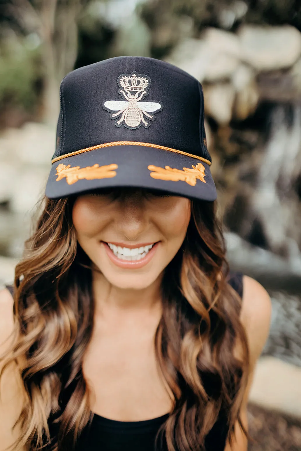 The Ascot Bee Trucker Hat sold by Glitzy Bella