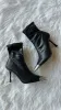 The Bridget Silver Toe Bootie in Black sold by Glitzy Bella
