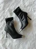 The Bridget Silver Toe Bootie in Black sold by Glitzy Bella