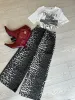 FINAL SALE!! The Leopard Lauren Denim Midi Skirt sold by Glitzy Bella