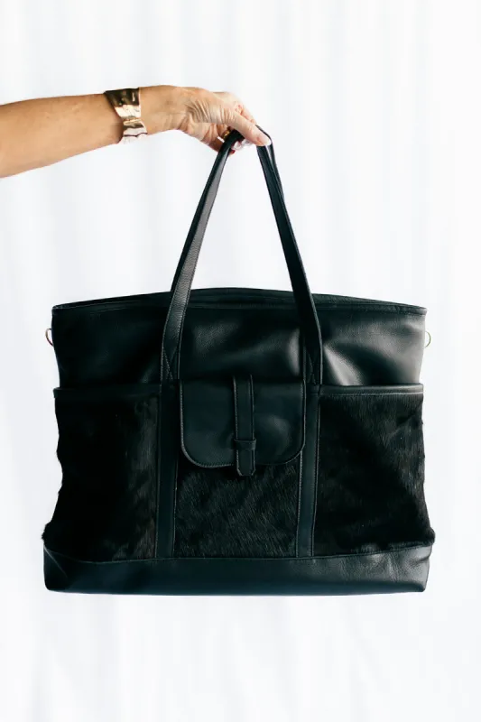 EXCLUSIVE!! Leather and Cowhide Travel Bag in Black sold by Glitzy Bella