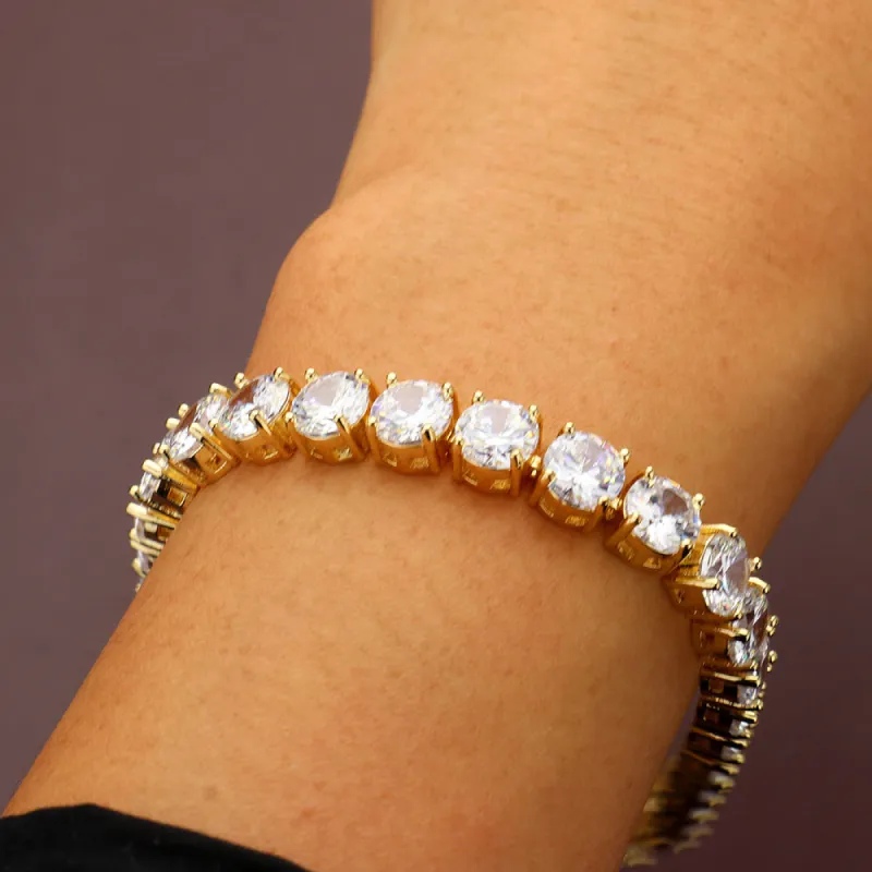 NEW!! Glamorous Tennis Bracelet in Gold sold by Glitzy Bella