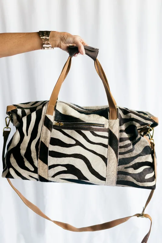 EXCLUSIVE!! Zebra Cowhide Duffel Bag sold by Glitzy Bella
