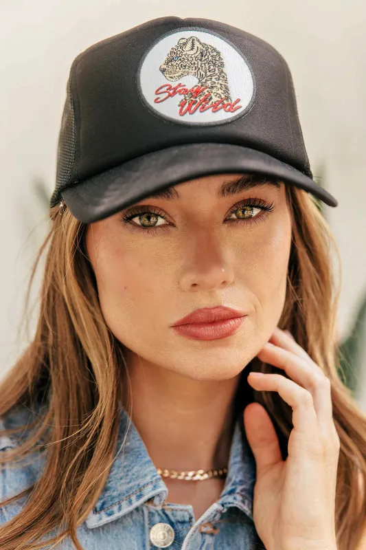 NEW!! "Stay Wild" Trucker Hat in Black sold by Glitzy Bella